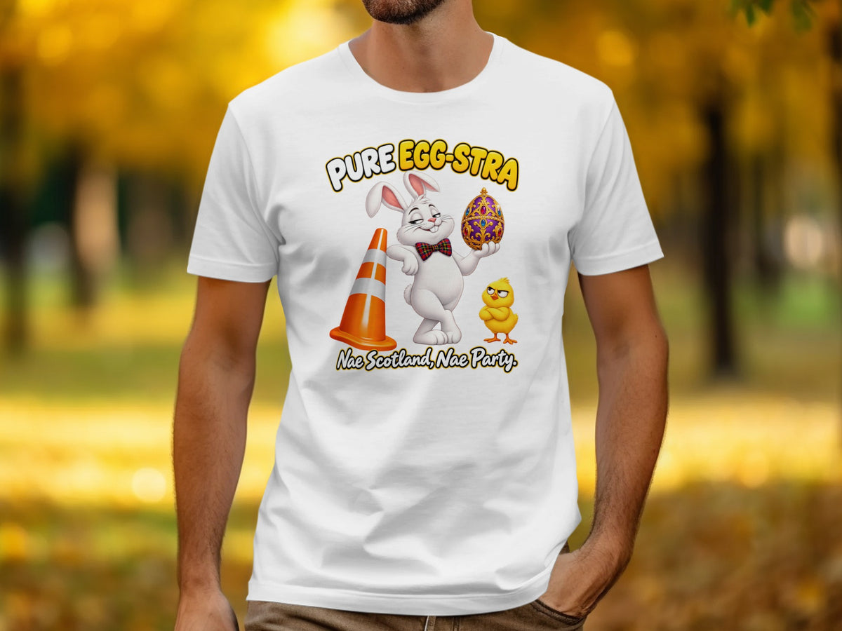 White t-shirt with cartoon rabbit, chick, egg, and traffic cone. Text: "PURE EGG-STRA Nae Scotland, Nae Party."