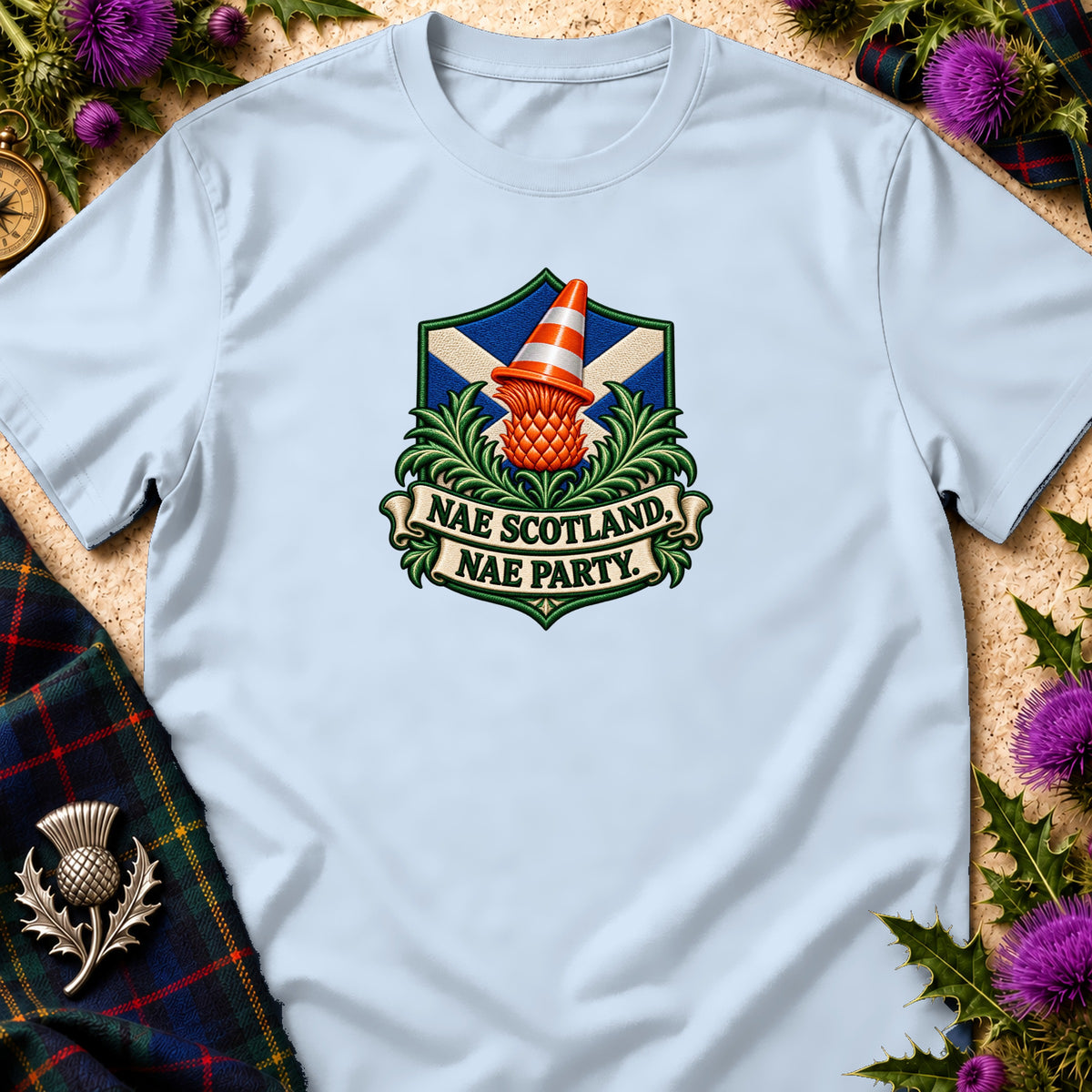 Light blue t-shirt featuring a crest with a thistle wearing a traffic cone and text reading NAE SCOTLAND NAE PARTY.