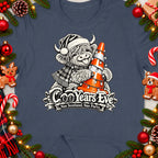 Highland cow in Santa hat holds traffic cone with lights, text "CooYears Eve Nae Scotland, Nae Party".