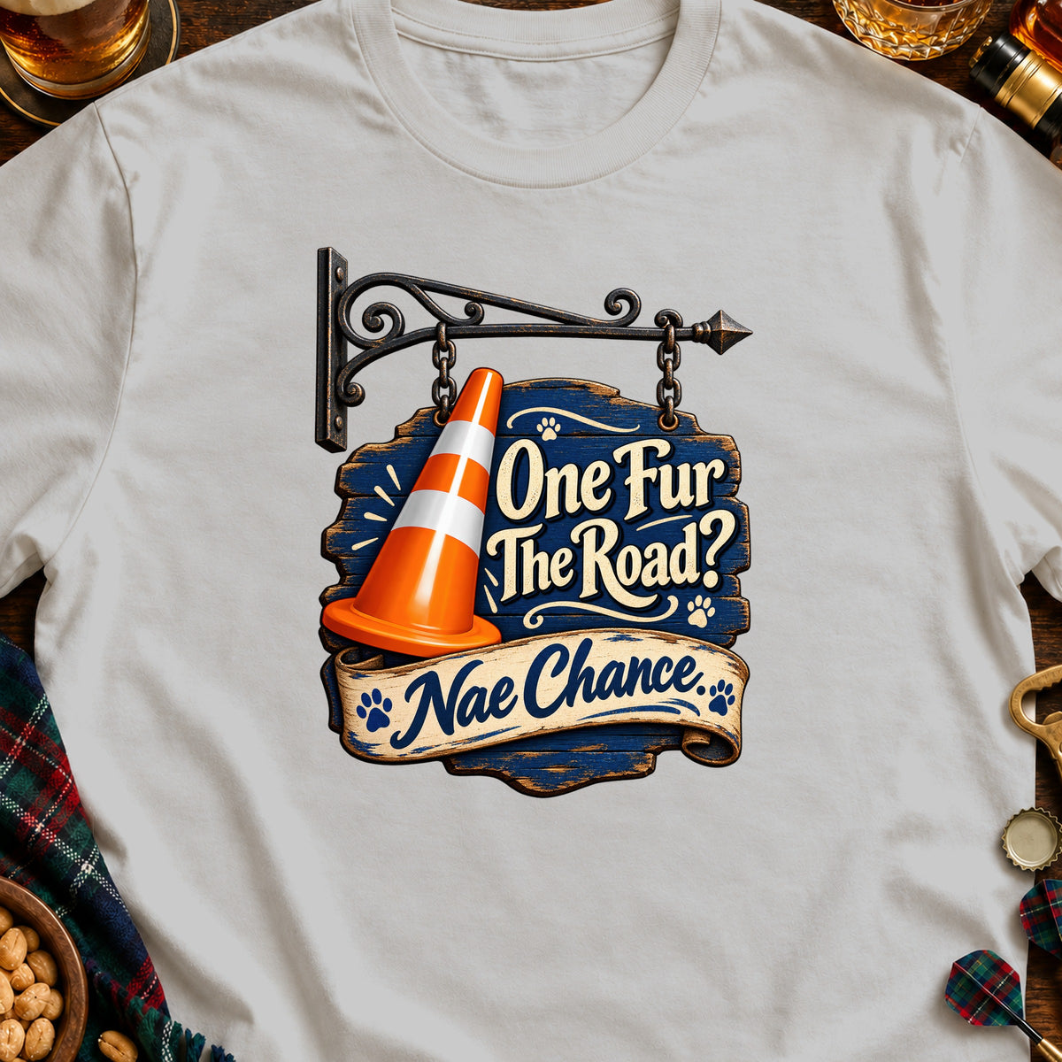 White t-shirt with a vintage sign graphic reading "One Fur The Road? Nae Chance."