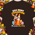 A cartoon rabbit holds an orange traffic cone next to Easter eggs with text.