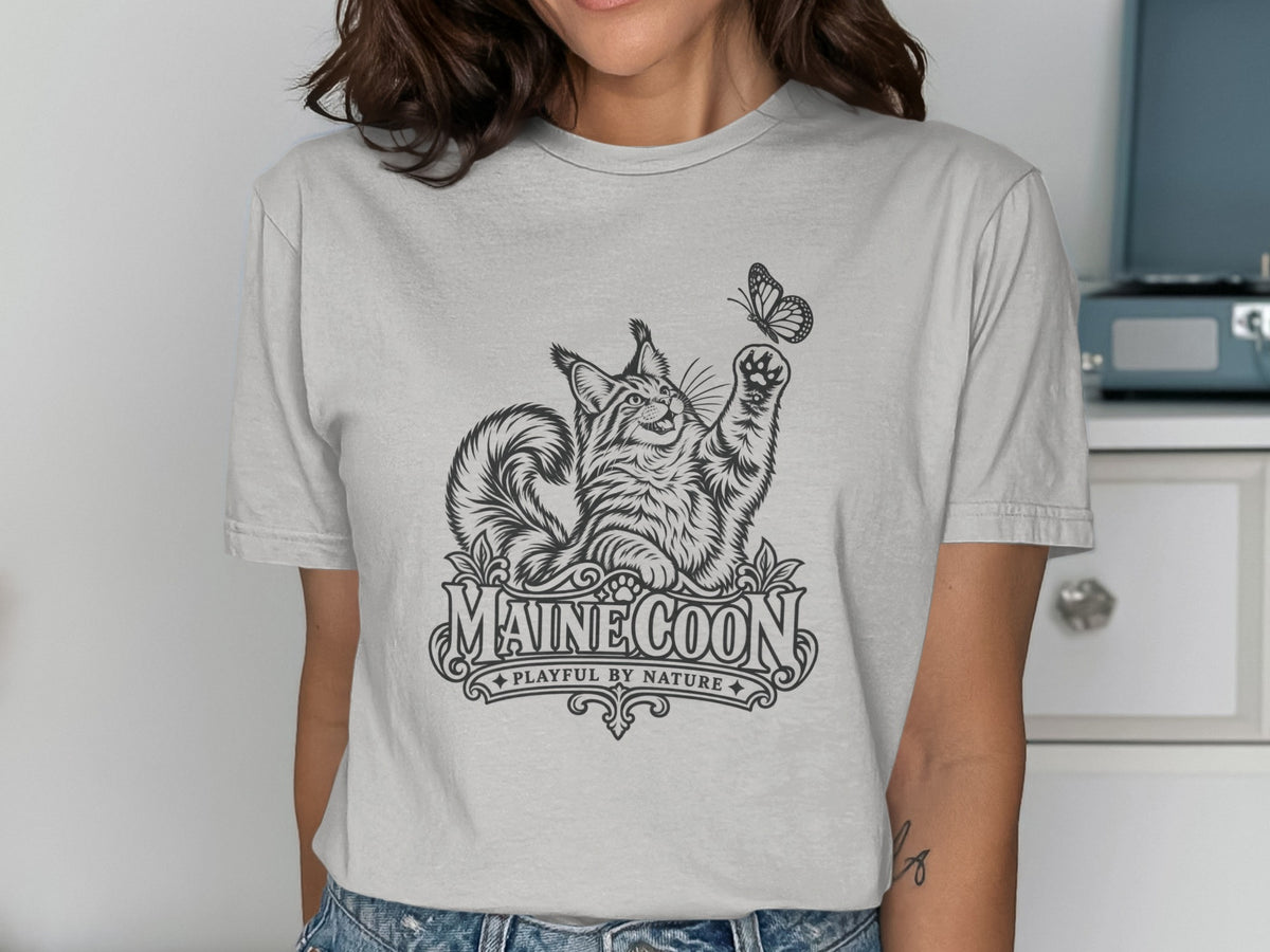 Maine Coon cat graphic with butterfly and text "Maine Coon Playful By Nature".