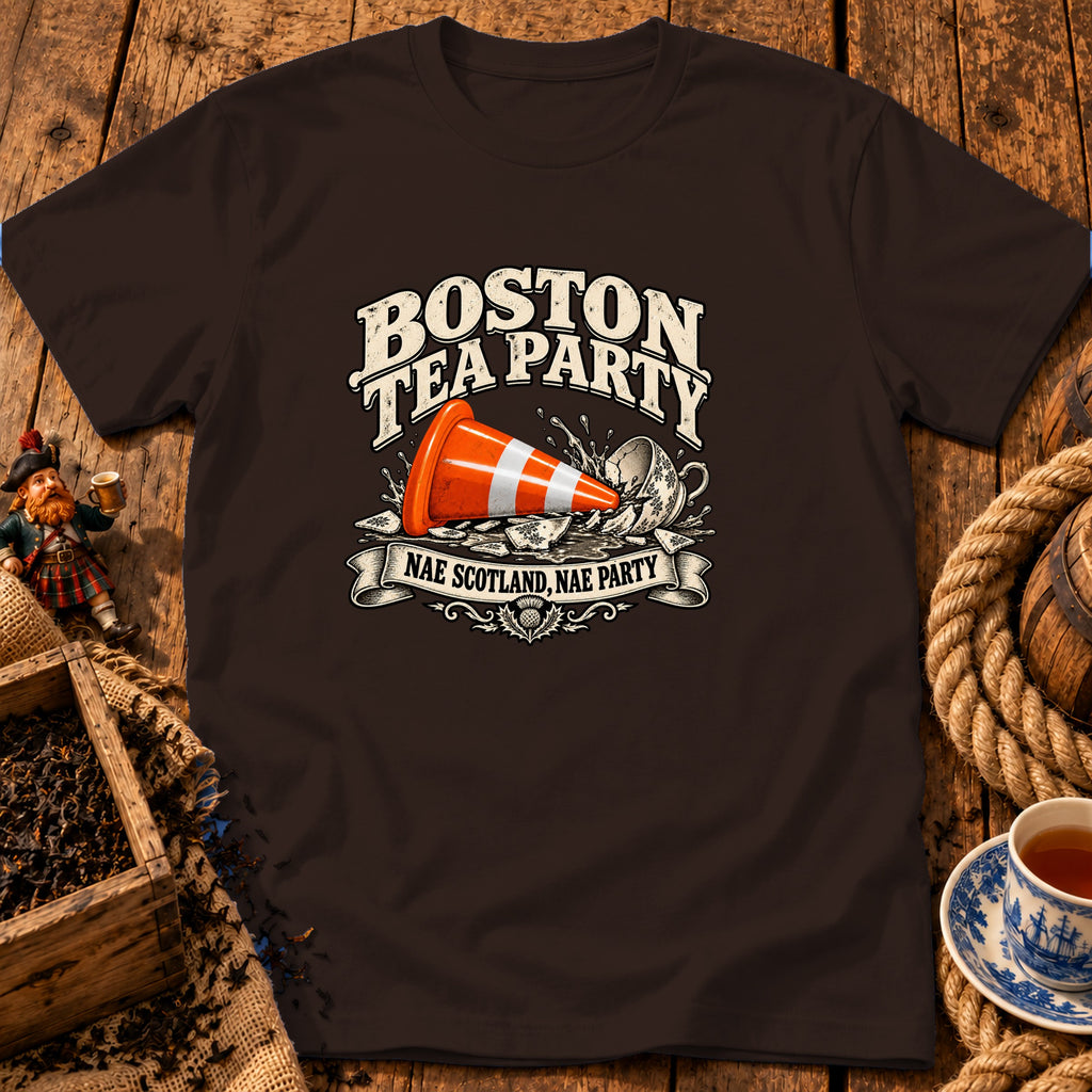 Brown t-shirt featuring a graphic with a traffic cone crashing into a teacup and text reading "Boston Tea Party" and "Nae Scotland, Nae Party."