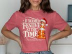 Red t-shirt with text "It Seemed Festive At The Time" and a traffic cone with Santa hat.