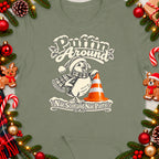 Puffin wearing a Santa hat and scarf, with "Puffin Around" and "Nae Scotland Nae Party" text.