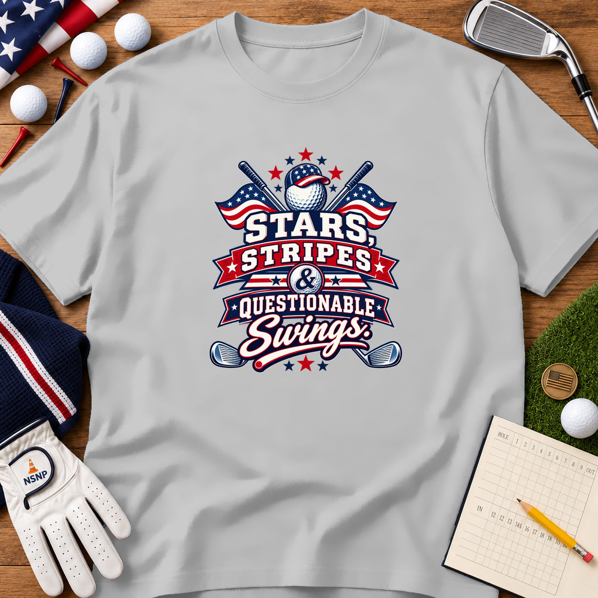 A light gray t-shirt featuring a red, white, and blue graphic with golf and patriotic elements.