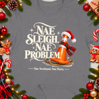 T-shirt with "Nae Sleigh. Nae Problem." and a traffic cone on a sleigh.