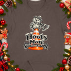 Owl on traffic cone wearing tartan hat and scarf, text "Hoots Mon! Nae Scotland, Nae Party."
