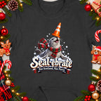 Seal with a traffic cone and scarf, text "Seal-ebrate Nae Scotland, Nae Party."