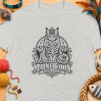Gray t-shirt with a graphic of a regal Maine Coon cat wearing a crown and mountains.