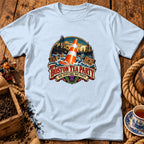 Light blue crewneck t-shirt featuring a graphic print of a traffic cone in turbulent ocean water, alongside ships, crates, and the text "Boston Tea Party / Nae Scotland, Nae Party".