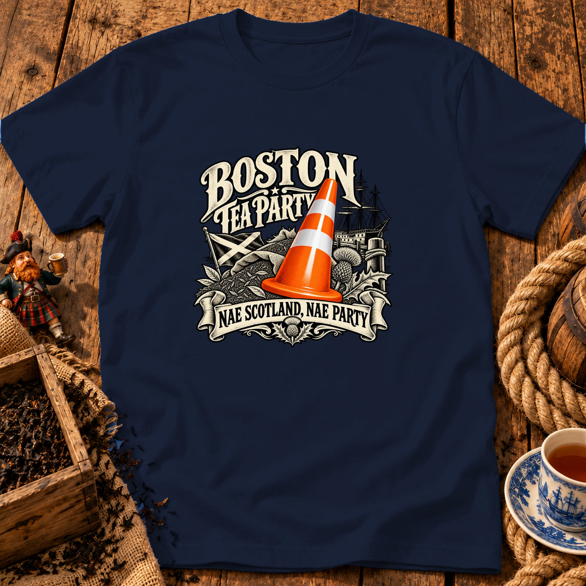 Dark blue crewneck t-shirt featuring a graphic with a traffic cone, ship, and text "Boston Tea Party Nae Scotland, Nae Party".