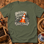 An olive green t-shirt features a graphic with a traffic cone and the text Boston Tea Party Nae Scotland, Nae Party.