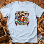 Light blue t-shirt featuring a Boston Tea Party graphic with a traffic cone and Scottish imagery.