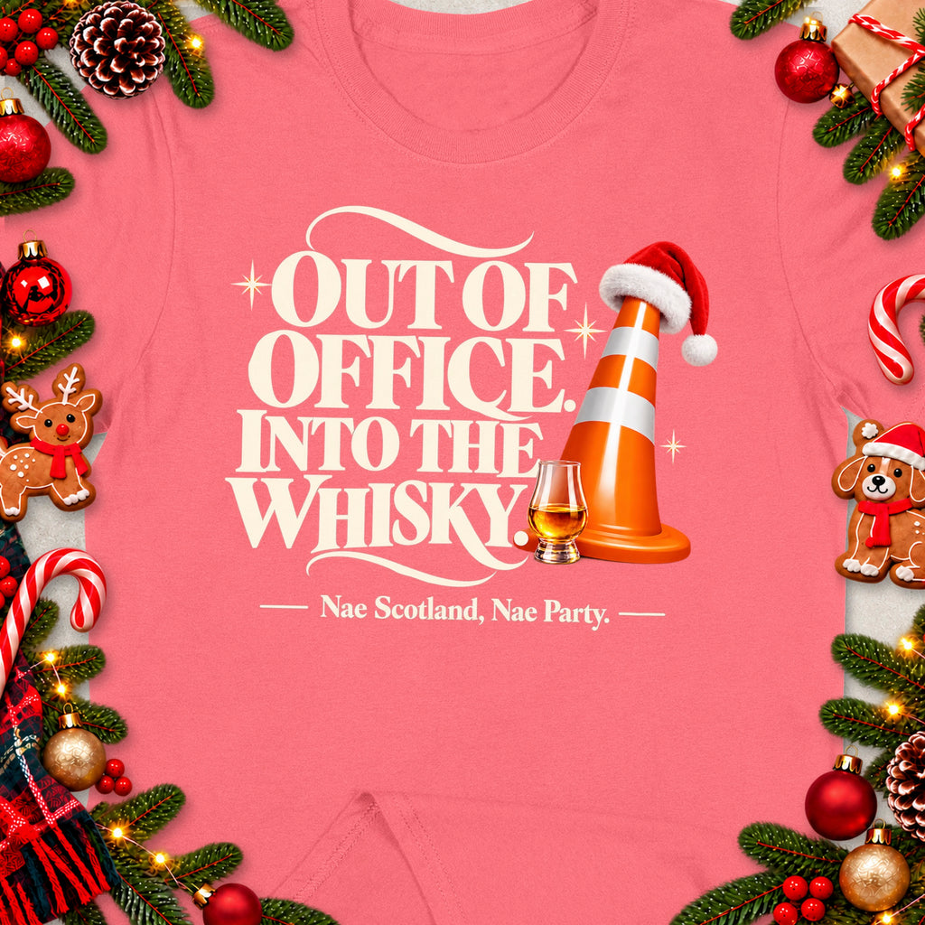 Pink t-shirt with "Out of Office, Into the Whisky" text and Christmas decor.