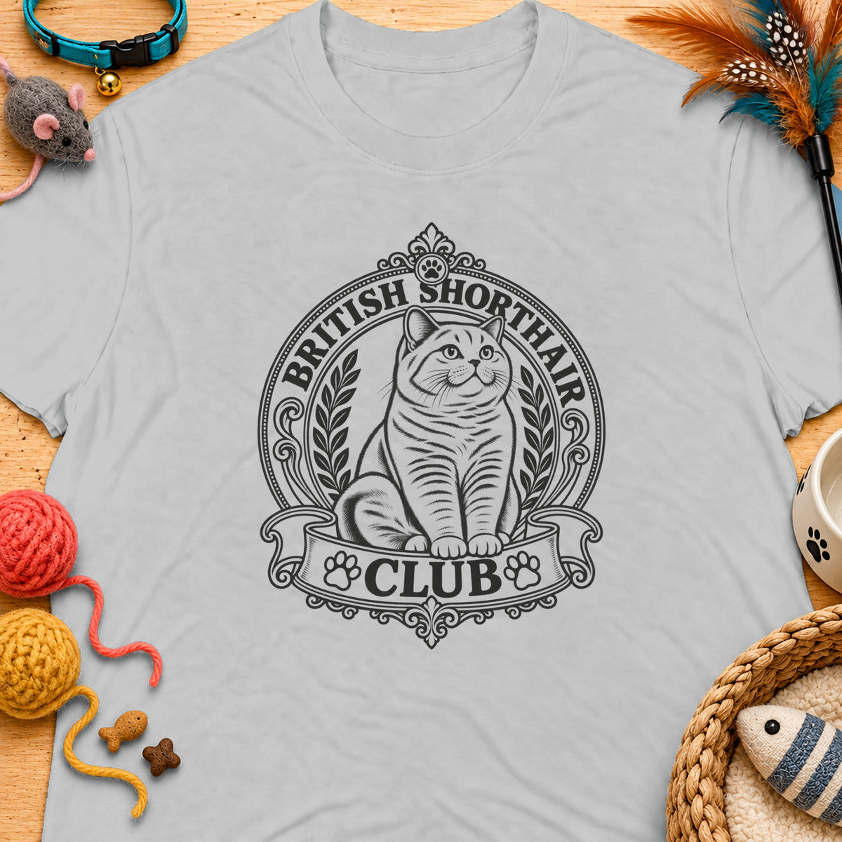 British Shorthair Club logo with a cat, text, and surrounding decorative elements.