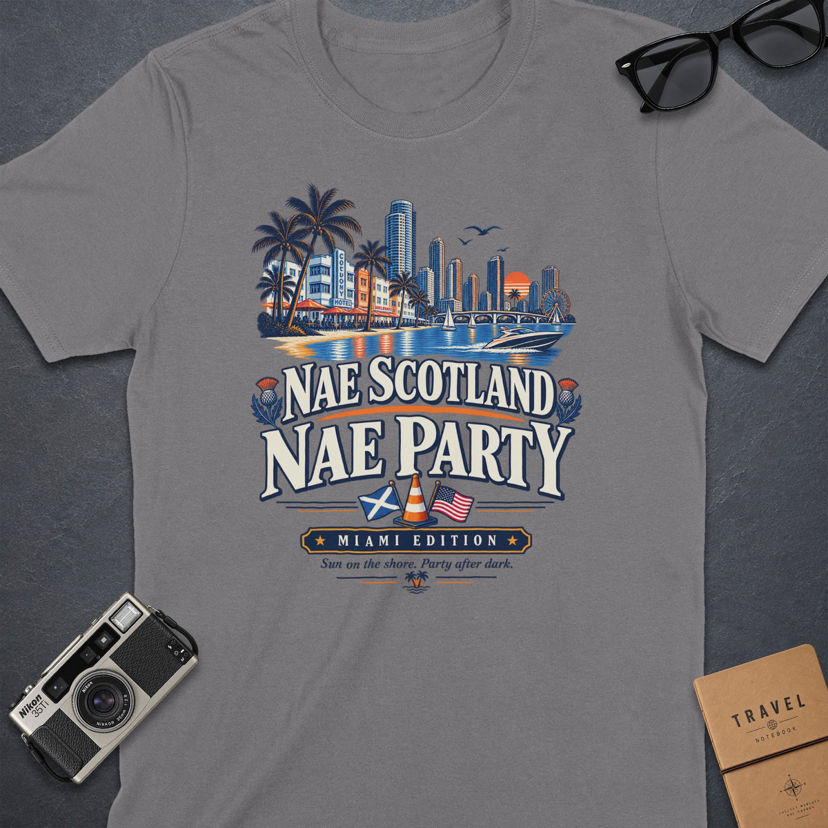Gray t-shirt with "Nae Scotland Nae Party Miami Edition" and a Miami cityscape graphic.