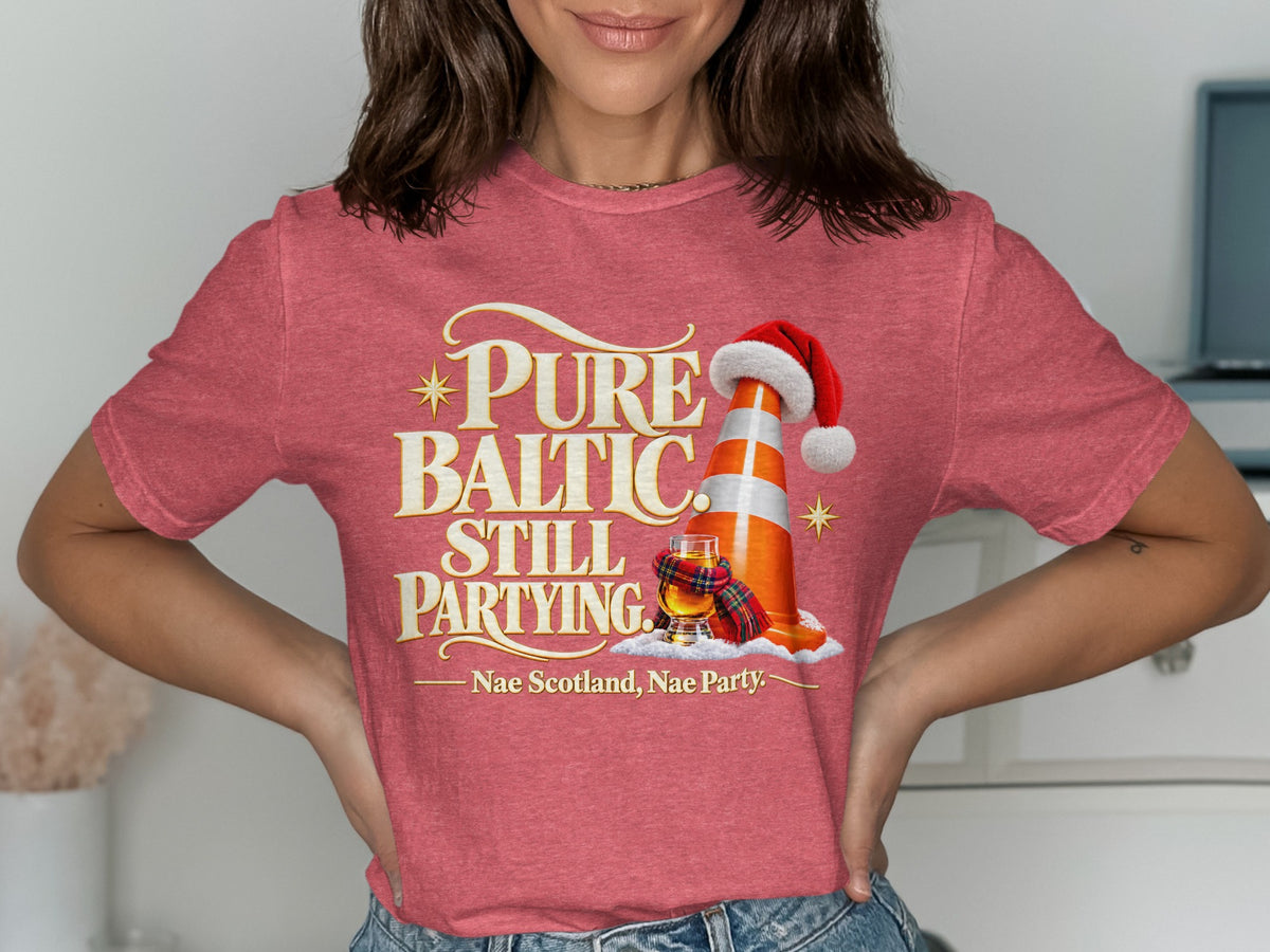 Red t-shirt with "Pure Baltic Still Partying" text and traffic cone.