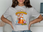 Bunny in tartan shirt with traffic cone and Easter eggs, text Egg Hunt Champion.