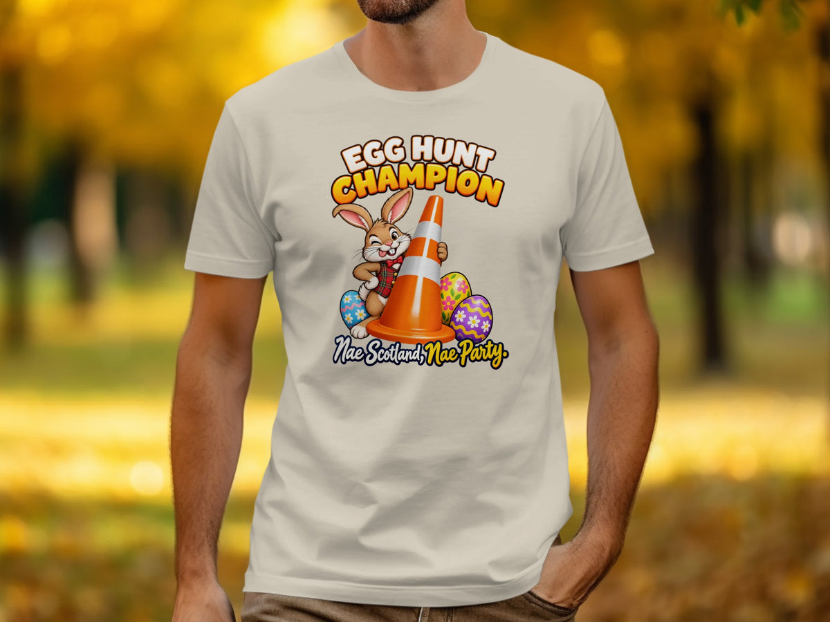 T-shirt with cartoon bunny, traffic cone, and Easter eggs; text "Egg Hunt Champion".