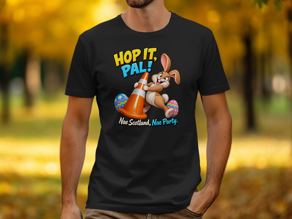 T-shirt with cartoon bunny, traffic cone, and Easter eggs with text "Hop It, Pal!".