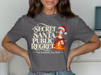 T-shirt with "Secret Santa, Public Regret. Nae Scotland, Nae Party." and a traffic cone.