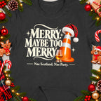 T-shirt with text "Merry Maybe Too Merry" and a traffic cone.