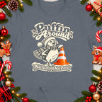 Puffin wearing a Santa hat and scarf, with text "Puffin Around Nae Scotland Nae Party".