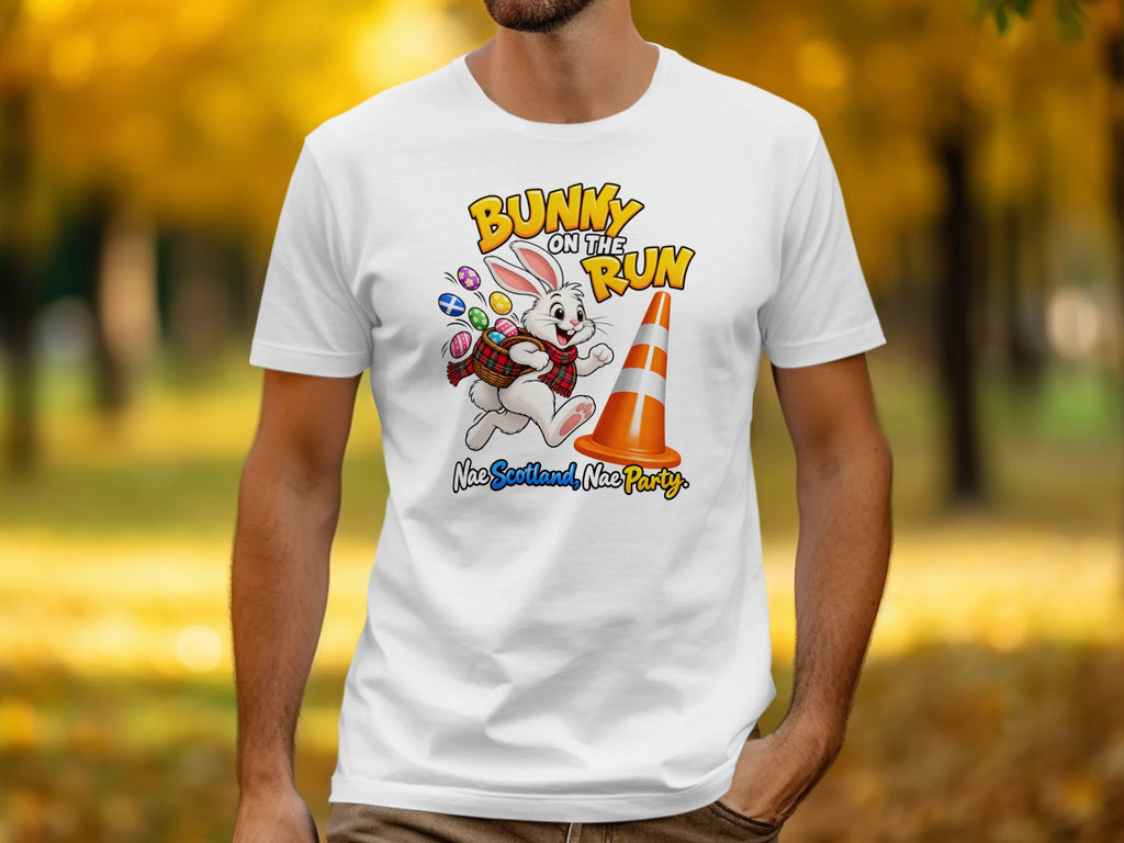 White t-shirt with a cartoon bunny, Easter eggs, and text "Bunny on the Run".