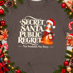 T-shirt with "Secret Santa Public Regret" text and a traffic cone.