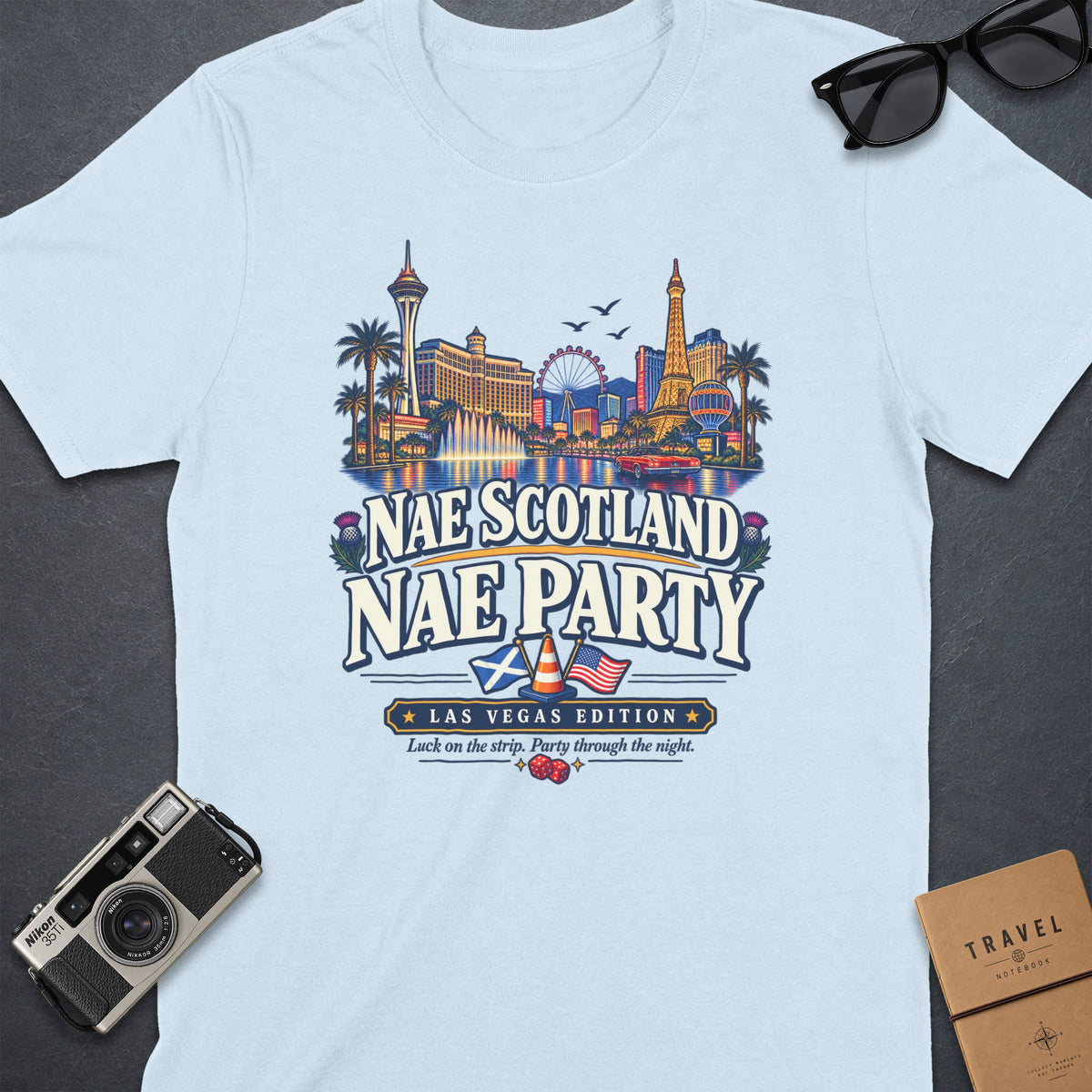 Light blue t-shirt with "Nae Scotland Nae Party" and Las Vegas skyline graphic.