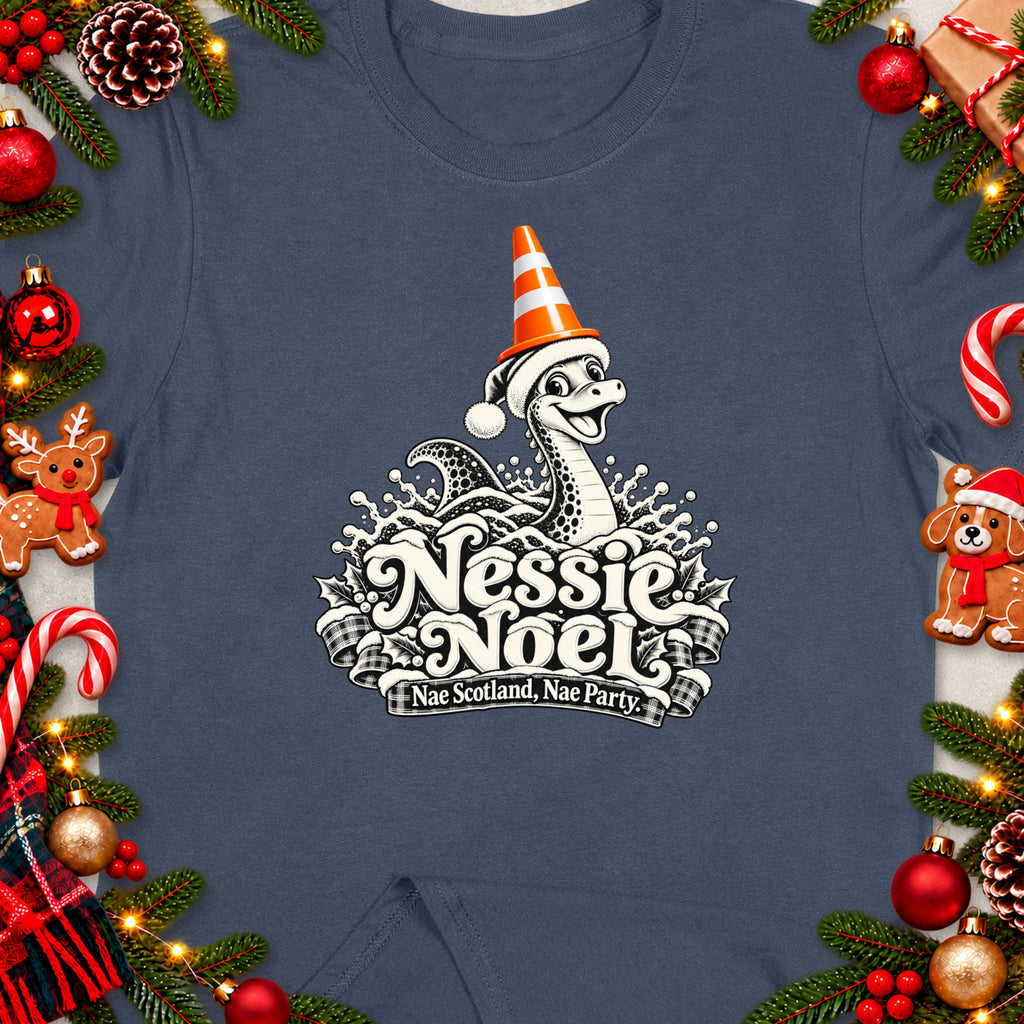 Nessie Noel graphic with text "Nae Scotland, Nae Party." on a navy shirt.
