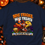 Halloween-themed t-shirt with witch, pumpkins, castle, Scottish flag and text.