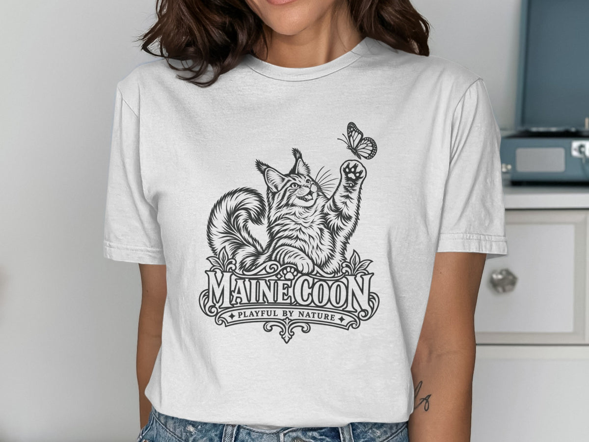 White t-shirt with Maine Coon cat and butterfly graphic and text.