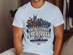 White t-shirt with Nashville skyline, guitar, and "Nae Scotland Nae Party Nashville Edition" text.