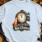 T-shirt graphic with clock, orange cone, and text "One Fur The Road? Nae Chance."