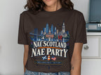 Brown t-shirt with Philadelphia skyline, Scottish and American flags, and "Nae Scotland Nae Party" text.