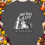 A bunny sits by an empty Easter basket and traffic cone with text "NAE EGGS LEFT".