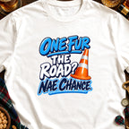 White t-shirt with text "ONE FUR THE ROAD? NAE CHANCE" and a traffic cone.
