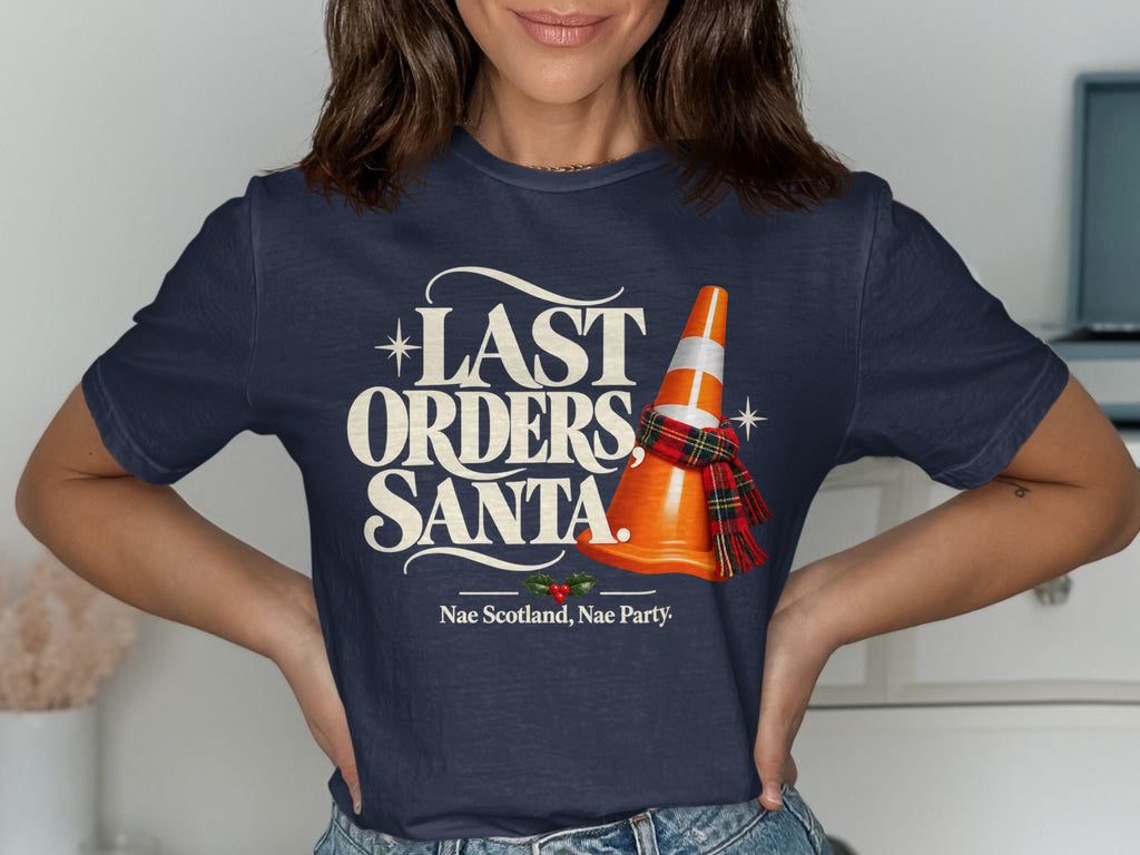 Navy t-shirt with "Last Orders, Santa" text and an orange traffic cone with a tartan scarf.
