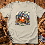 A light grey t-shirt featuring a Boston Tea Party graphic with a traffic cone holding a teacup.