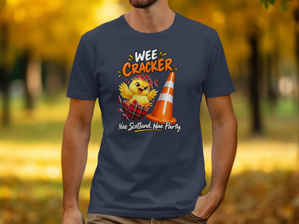 T-shirt with a chick hatching from a tartan egg, with text "WEE CRACKER" and "Nae Scotland, Nae Party."
