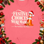 Festive Choices Were Made Nae Scotland Nae Party slogan on pink shirt.