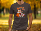 Brown t-shirt with "Hare of The Dog" and a bunny with a Scottish flag mug.