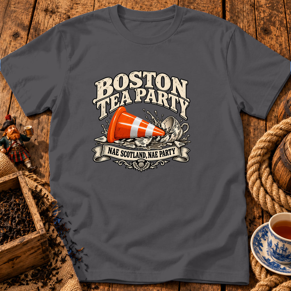 Dark grey t-shirt featuring a graphic with an orange traffic cone inside a smashed teacup and text reading BOSTON TEA PARTY and NAE SCOTLAND, NAE PARTY.