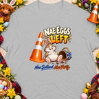 Cartoon bunny sitting next to an empty basket and traffic cone, text reads "Nae Eggs Left".