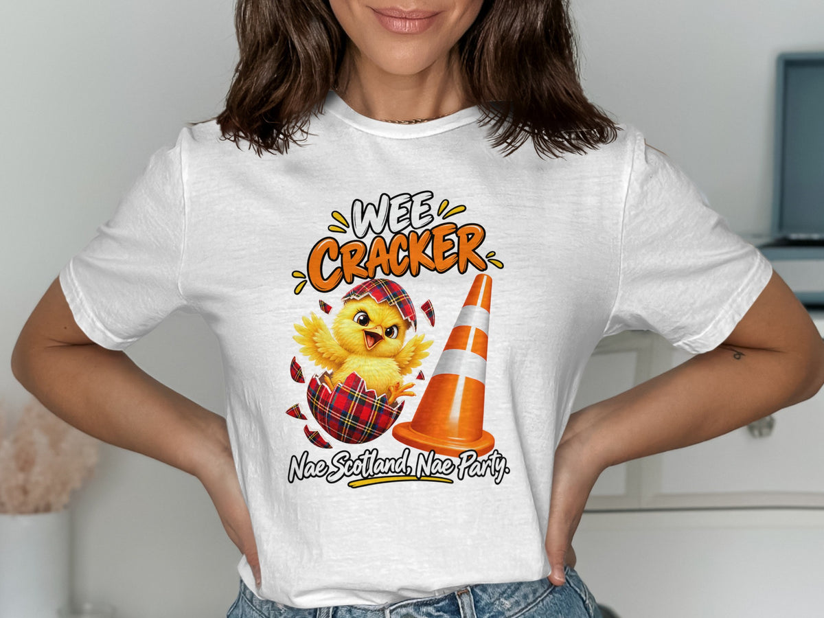 Chick hatching from eggshell with text "WEE CRACKER" and "Nae Scotland, Nae Party."