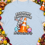 Cartoon bunny holding an orange traffic cone with text "Egg Hunt Champion".