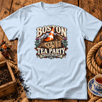 Light blue t-shirt featuring a Boston Tea Party graphic with a traffic cone and Scottish thistles.