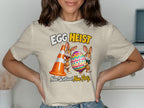 Egg Heist graphic with bunnies, a traffic cone, and colorful egg. Nae Scotland, Nae Party.